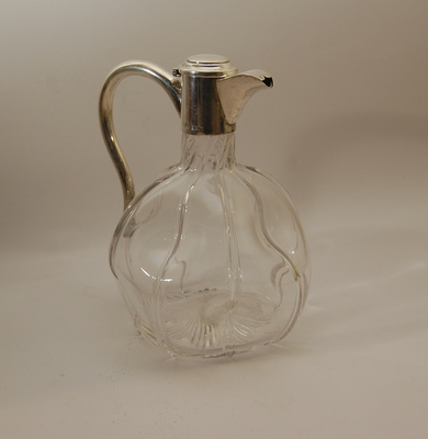 Edwardian decanter with silver lid and collar