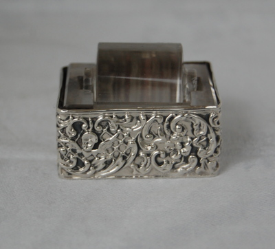 Edwardian stamp roller with silver embossed sleeve