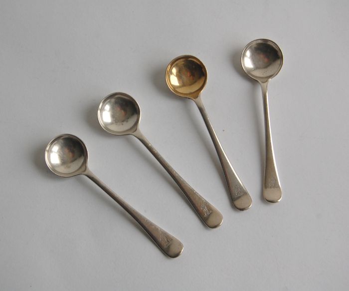 George V set of four silver salt spoons