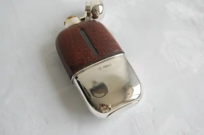 Edwardian Glass Hip Flask with Leather Shoulders and Silver Cup