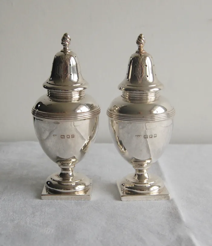 George V Pair of Silver Urn-shaped pepperettes